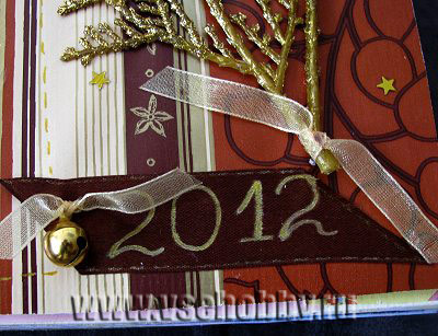 веточка и колокольчик на ленте с надписью фрагмент скрапбук странички о первом рождестве и новом годе новорожденной